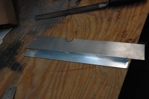 The bottom is aluminum angle, the top is the steel before bending