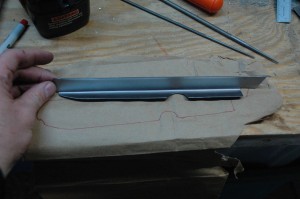 I made a paper template of the flat piece before I bent it.